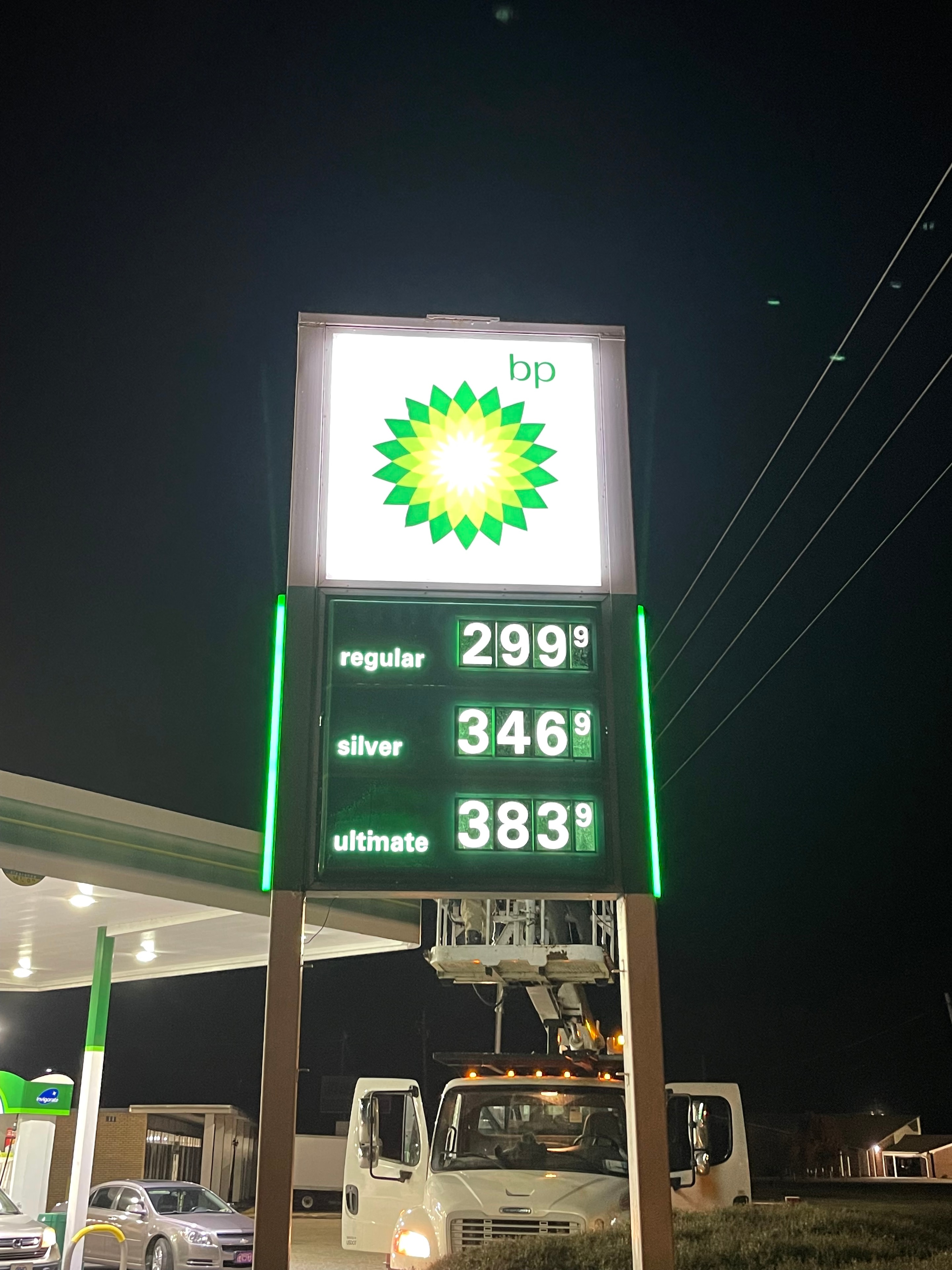 BP gas station illuminated price sign at night serviced by SOC