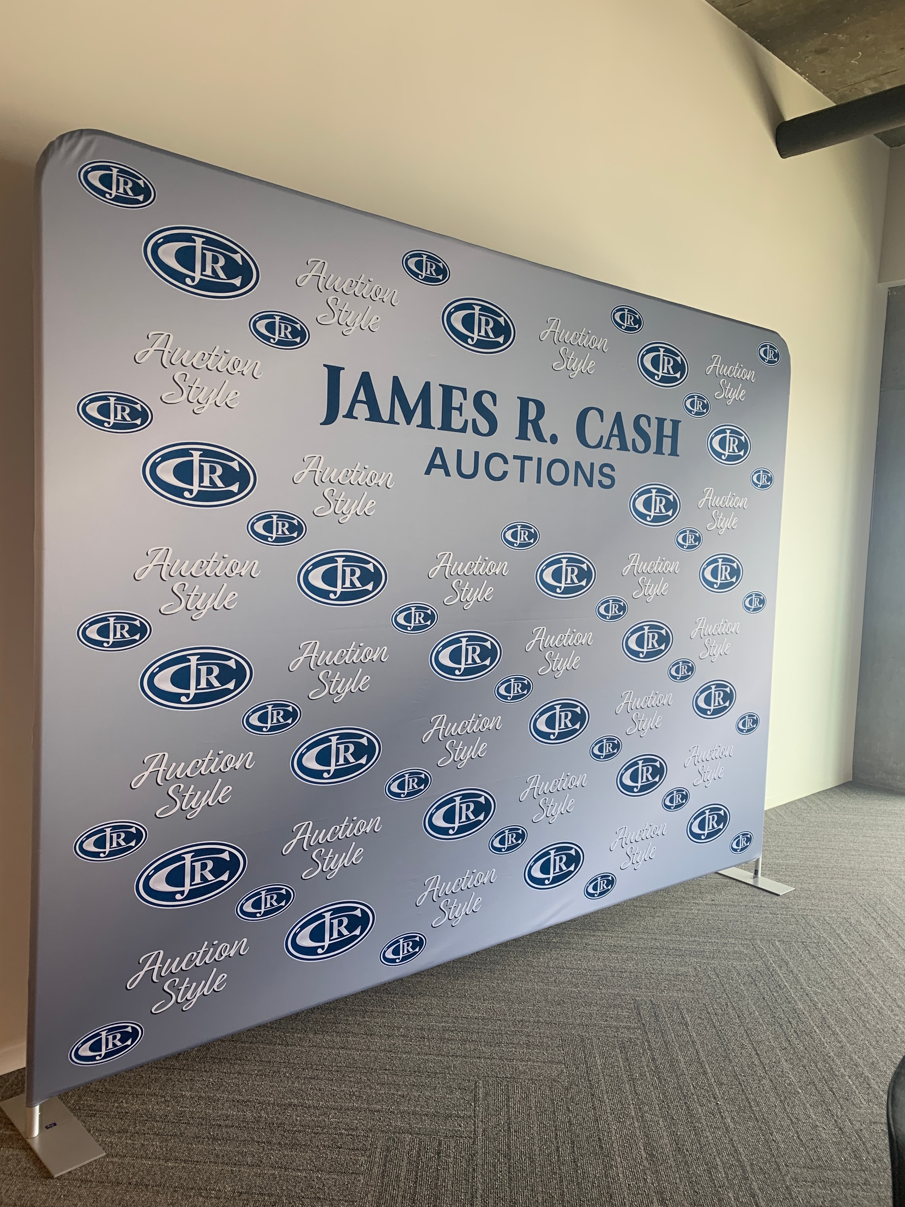 James R. Cash Auctions branded event backdrop banner