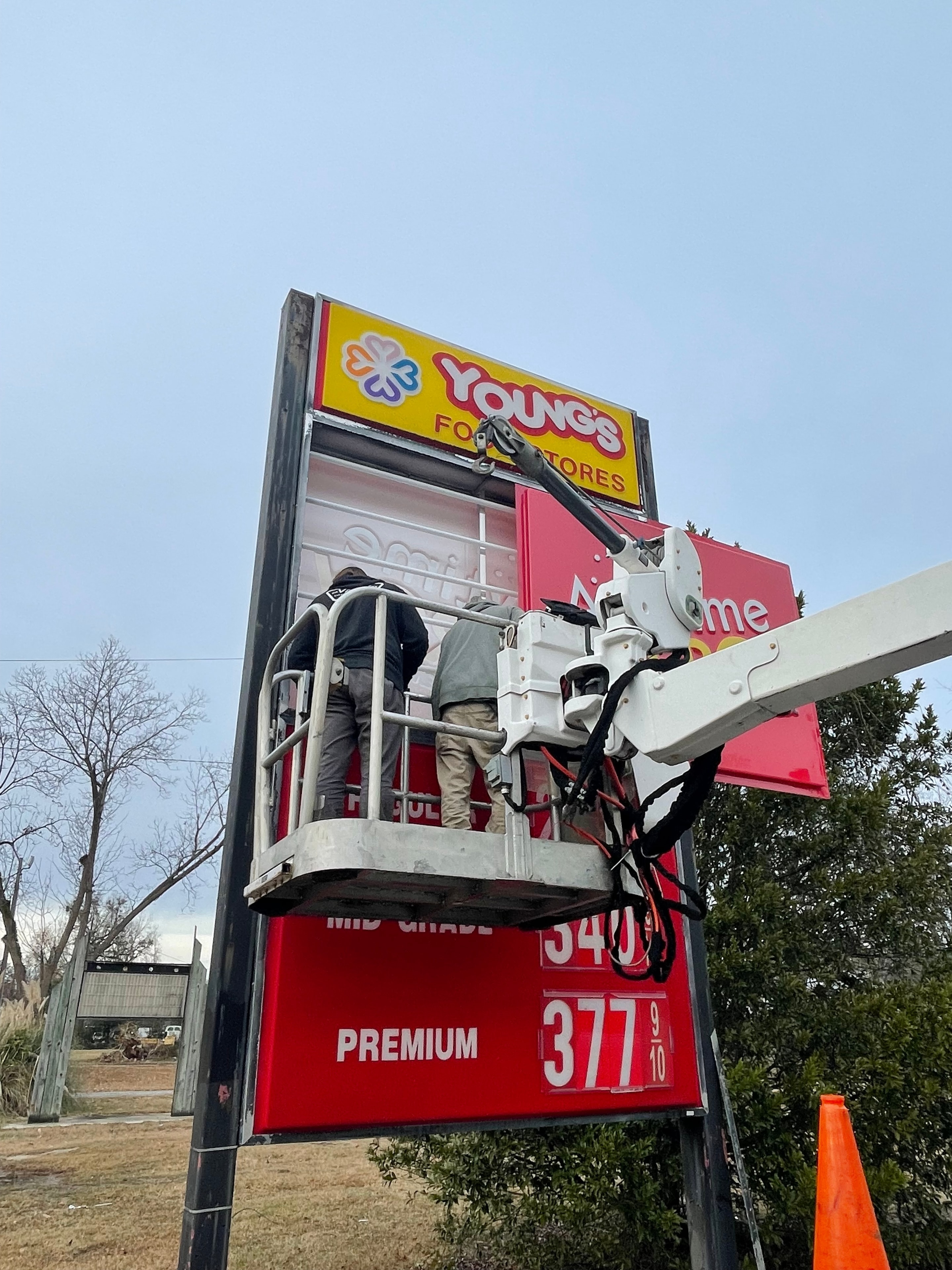 SOC crew servicing a sign from a bucket truck